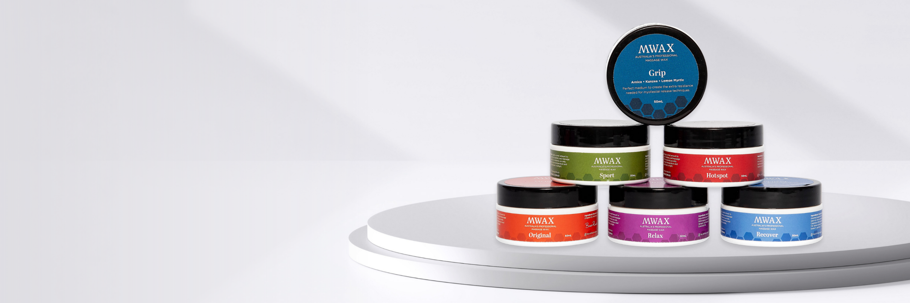 Small MWax Therapist 6-Pack products on a white surface with a light gray background